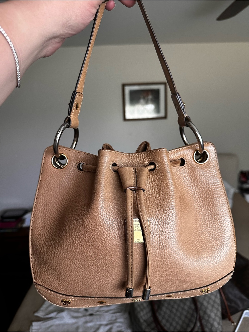 MCM Pebbled Leather Drawstring Shoulder Bag in Tan Brown